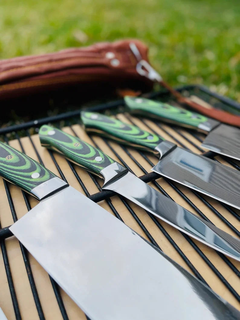 Custom Handmade J2 Steel kitchen knife set with G10 handles, steel bolsters, includes leather roll for storage, premium chef knives.