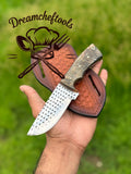Handmade 8-inch cowboy hunting knife with sheep horn handle, steel blade, and leather belt sheath by Knives Gear Garage.