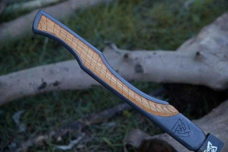 Handmade carbon steel Viking axe with leather sheath, ideal for outdoor camping and hunting, by Knives Gear Garage.