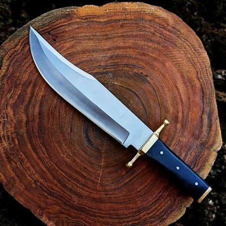 Handmade Bowie knife with D2 steel blade and buffalo horn handle, featuring intricate craftsmanship and durable construction.