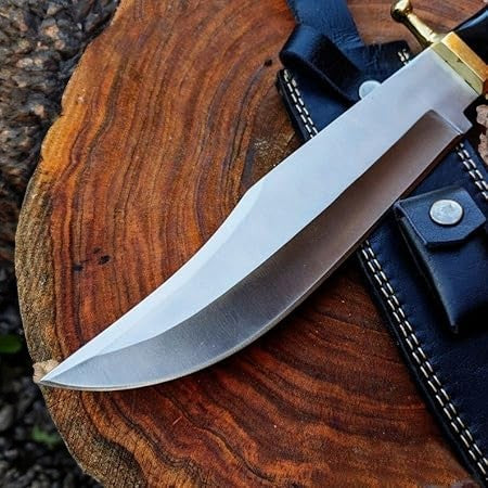 Handmade Bowie knife with D2 steel blade and buffalo horn handle, featuring a Damascus Knife Store design.