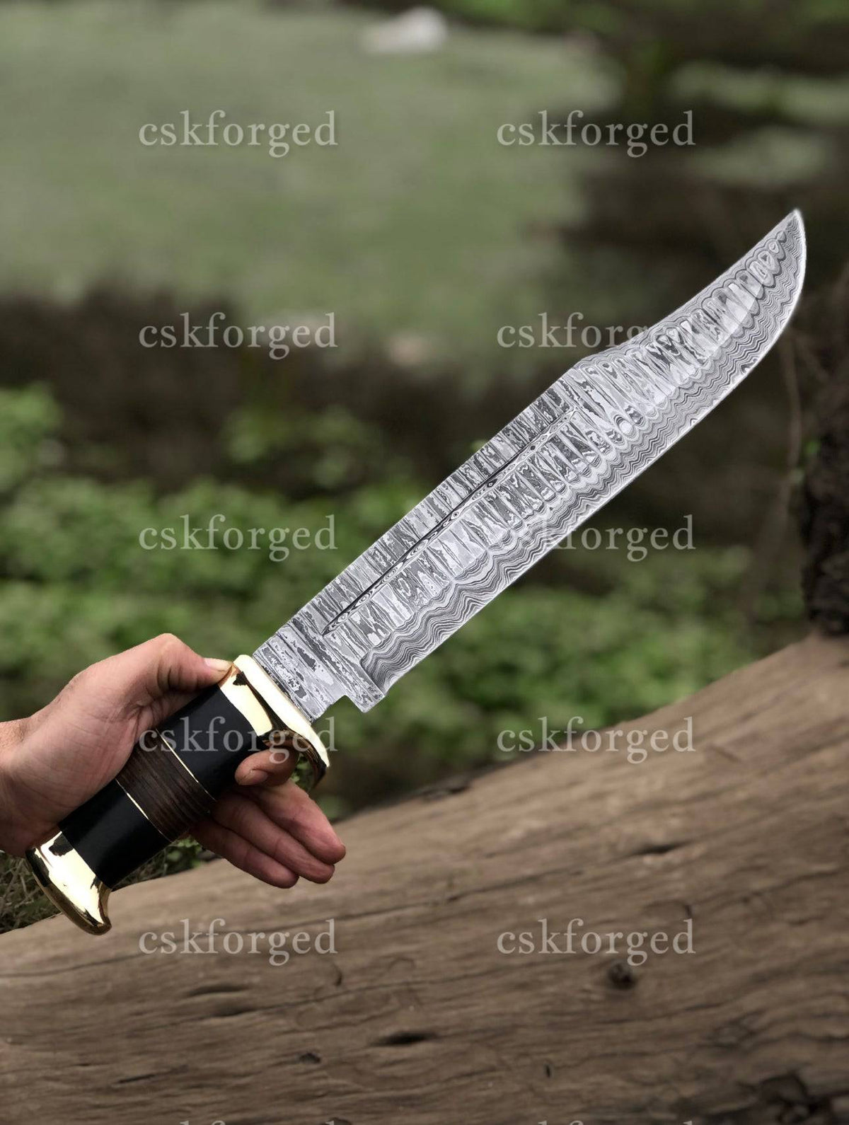 Handmade Damascus Steel Crocodile Dundee knife by cskforged, featuring a detailed blade and ergonomic handle.