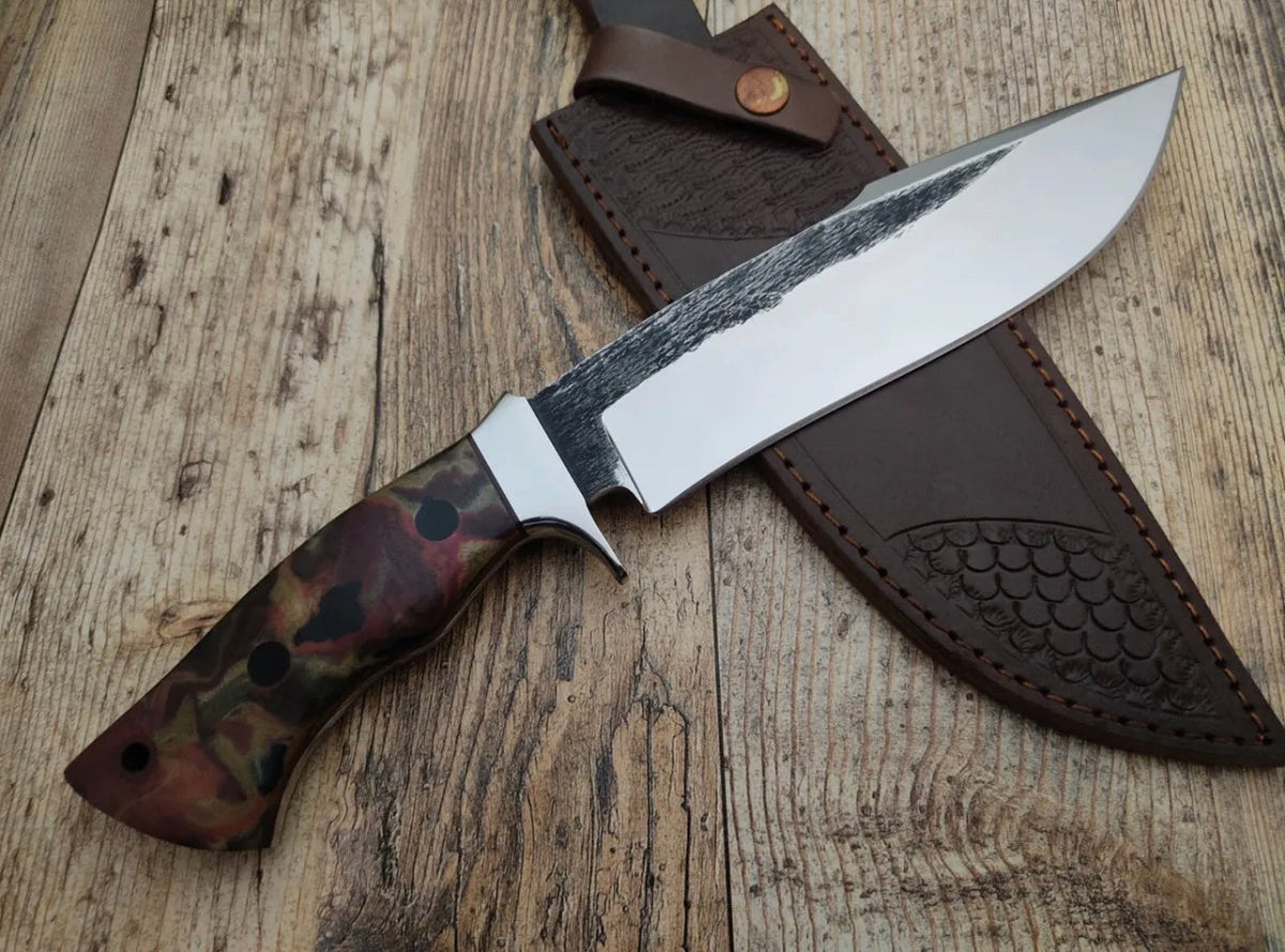 Handmade 1095-C steel bushcraft survival camping Bowie knife with a full tang blade and leather sheath by Knives Gear Garage