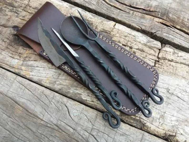 Hand forged antique medieval chef knife from cskforged, featuring a rustic blade and wooden handle in a detailed close-up image.