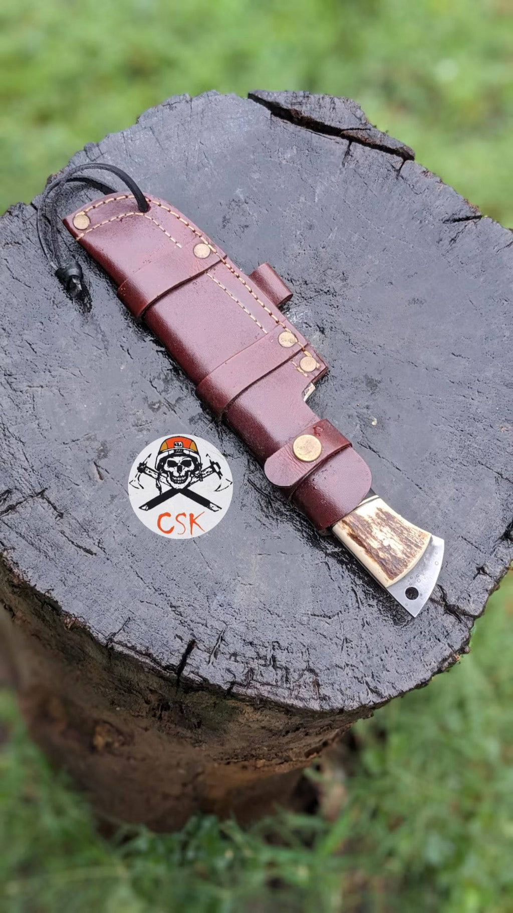 Handcrafted carbon steel hunting knife with antler handle by cskforged, featuring a rugged bushcraft survival blade and detailed craftsmanship.