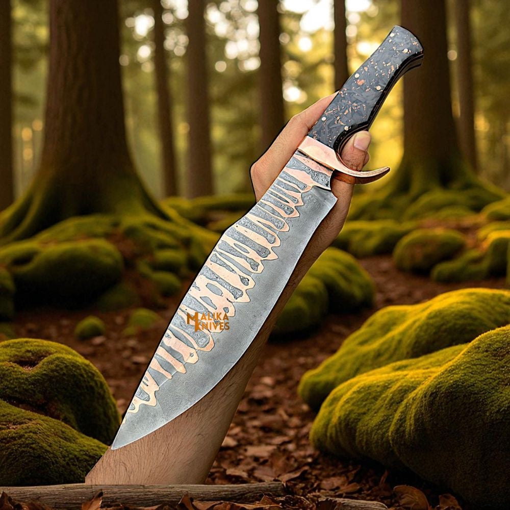 Copper Damascus Bowie Knife with carbon fiber handle by MALIKA KNIVES, showcasing its detailed blade and sleek handle design.