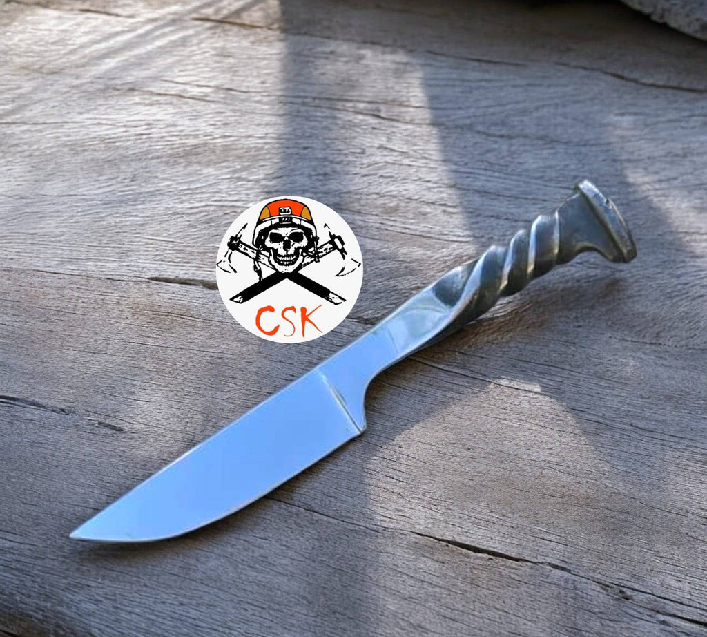 Forged railroad spike knife by cskforged, a hunting knife with a twisted handle and rugged artisan blade design.