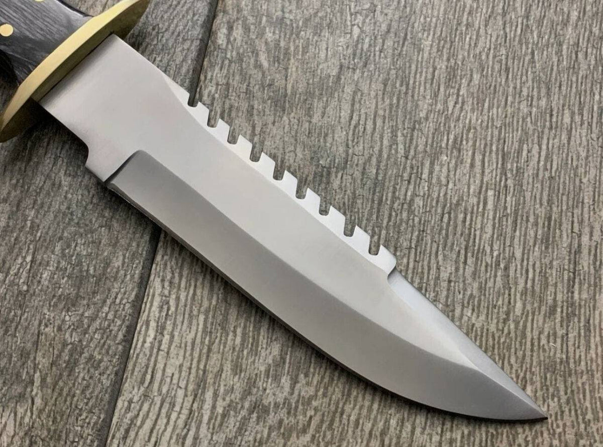 Handmade cskforged knife with brass guard and rose wood handle, showcasing a polished blade and detailed craftsmanship.