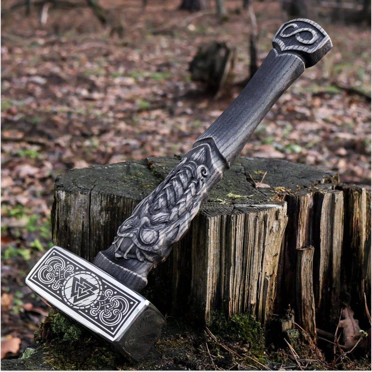 Cskforged Viking hammer hunting knife with a sturdy blade and wooden handle, ideal for outdoor and survival use.