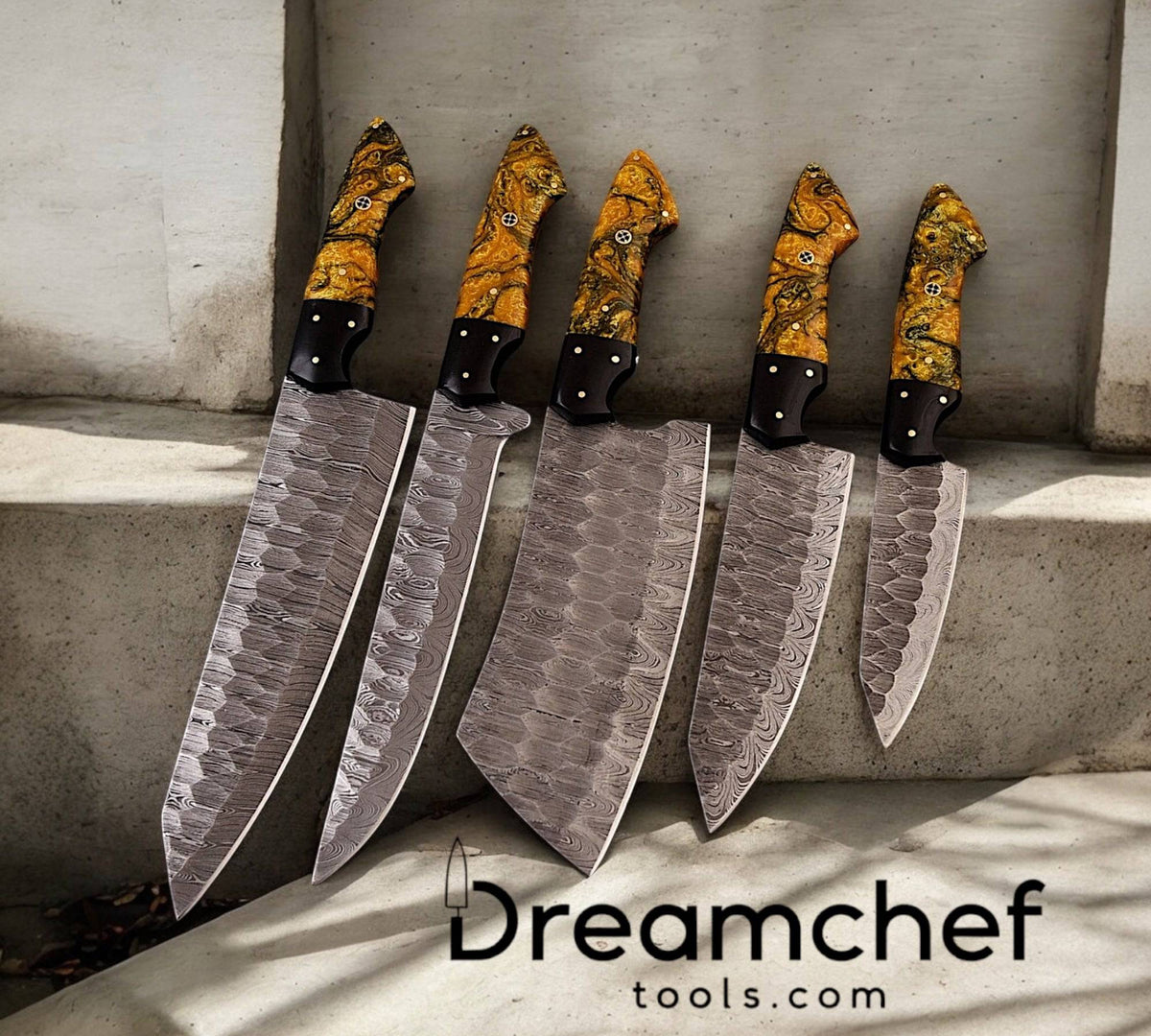 Damascus steel chef knife from Knives Gear Garage with epoxy resin handle and leather sheath in a kitchen knife set.