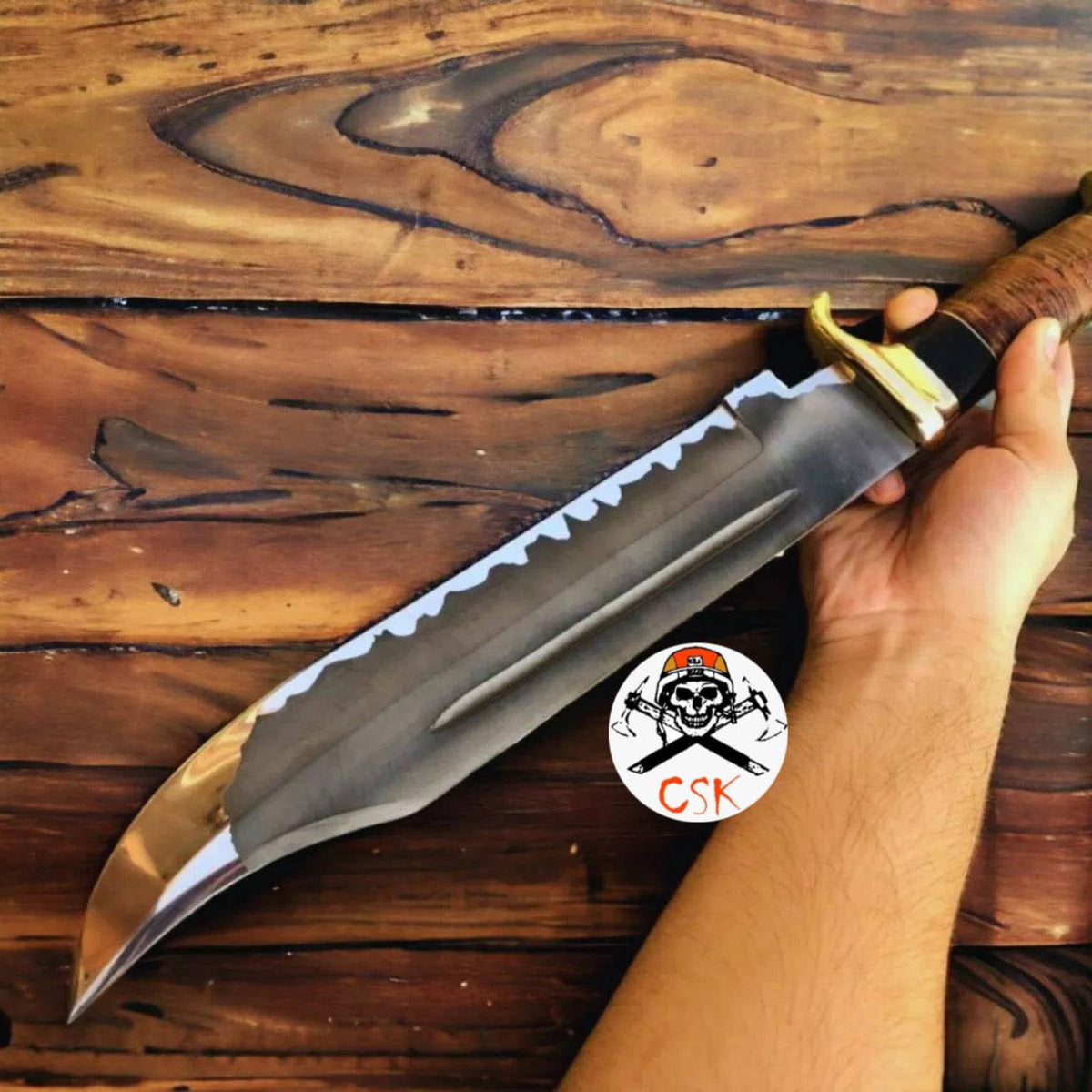 D2 steel Crocodile Dundee hunting knife by cskforged with acid-etched blade and rugged handle, ideal for outdoor survival and hunting.