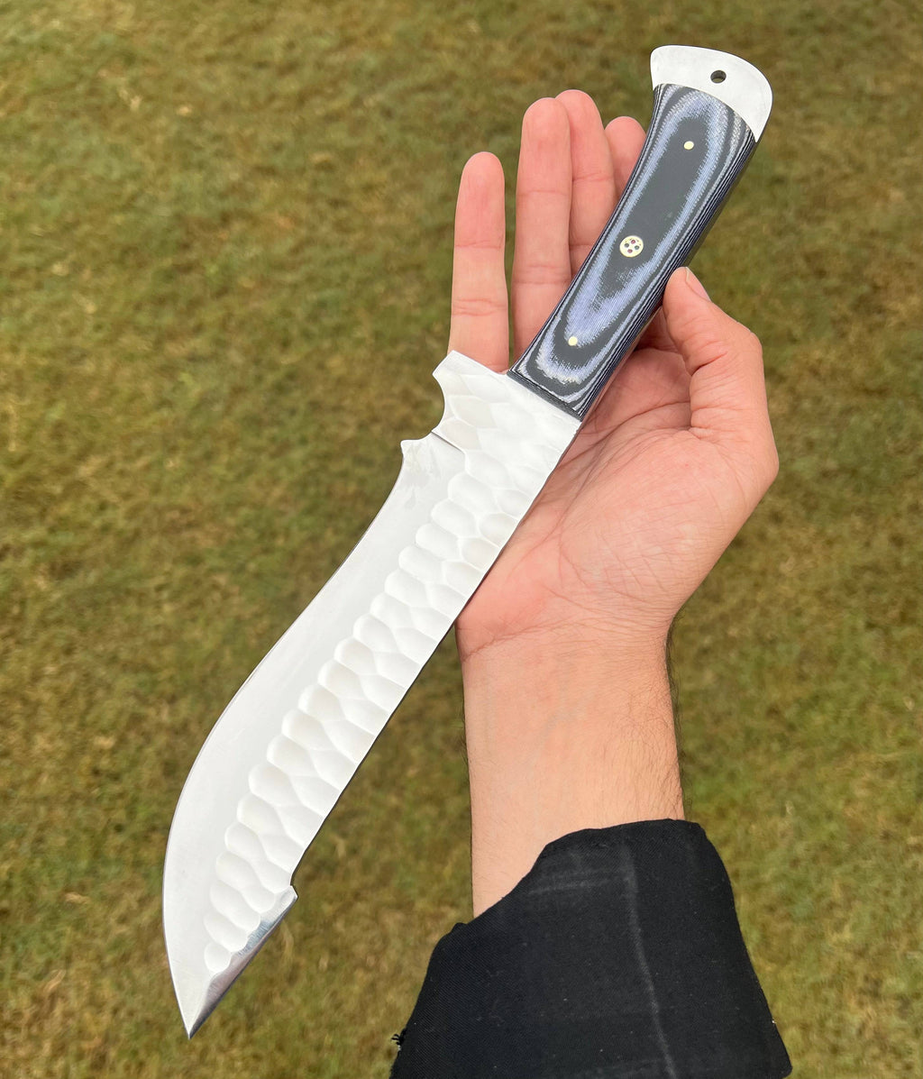 Fixed blade camping knife by cskforged, hand-forged from D2 steel with a durable handle, ideal for outdoor camping and survival.