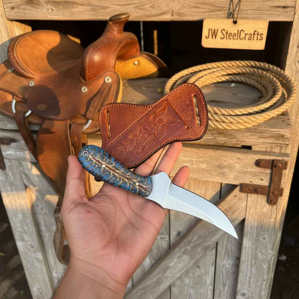 Handmade JW SteelCrafts Antler Ridge Skinner Knife with an 8-inch Damascus blade and stag horn handle.