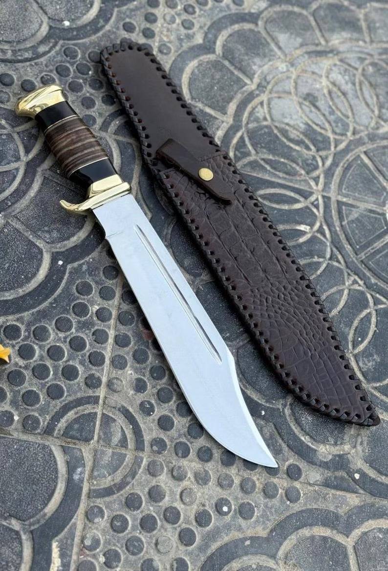 Cskforged Crocodile Dundee Outback inspired Dundee knife with polished blade and rugged handle, suitable for outdoor and hunting use.