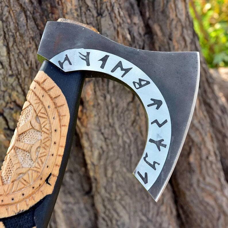 Custom forged handmade carbon steel Viking axe with wood handle and leather sheath, ideal for woodworking and outdoor use.