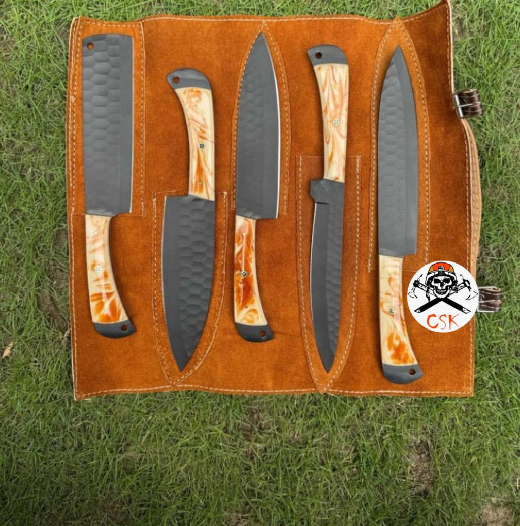 Black-coated artisan chef knife from cskforged with resin handle, showcasing sleek design and high-quality craftsmanship.