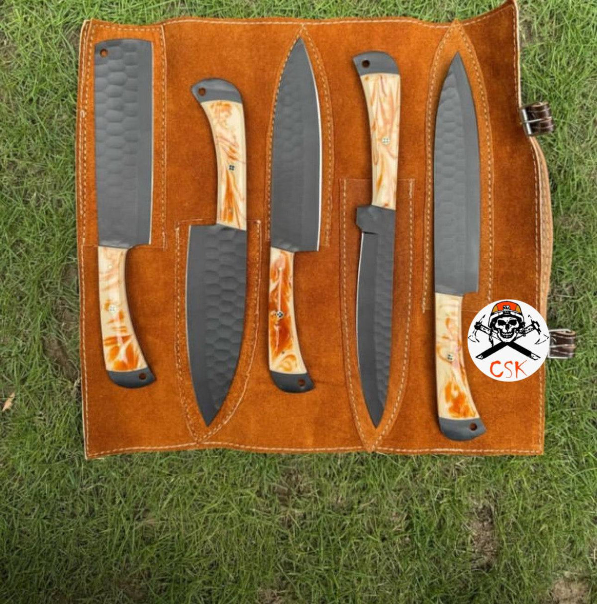 Black-coated artisan chef knife from cskforged with resin handle, showcasing sleek design and high-quality craftsmanship.