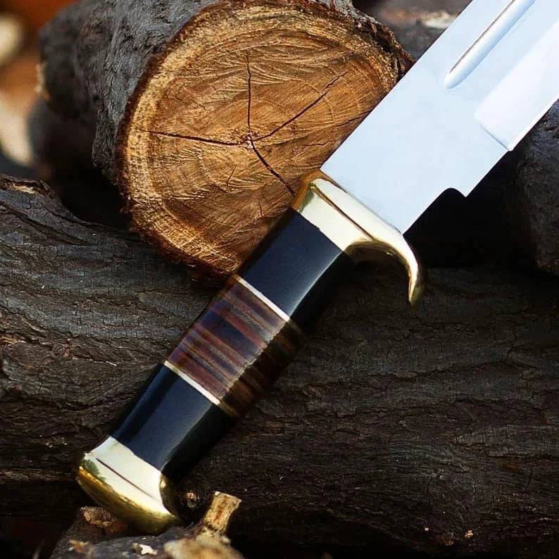 Handmade D2 steel Crocodile Dundee survival knife by cskforged with a textured handle and sharp blade for outdoor and survival use.