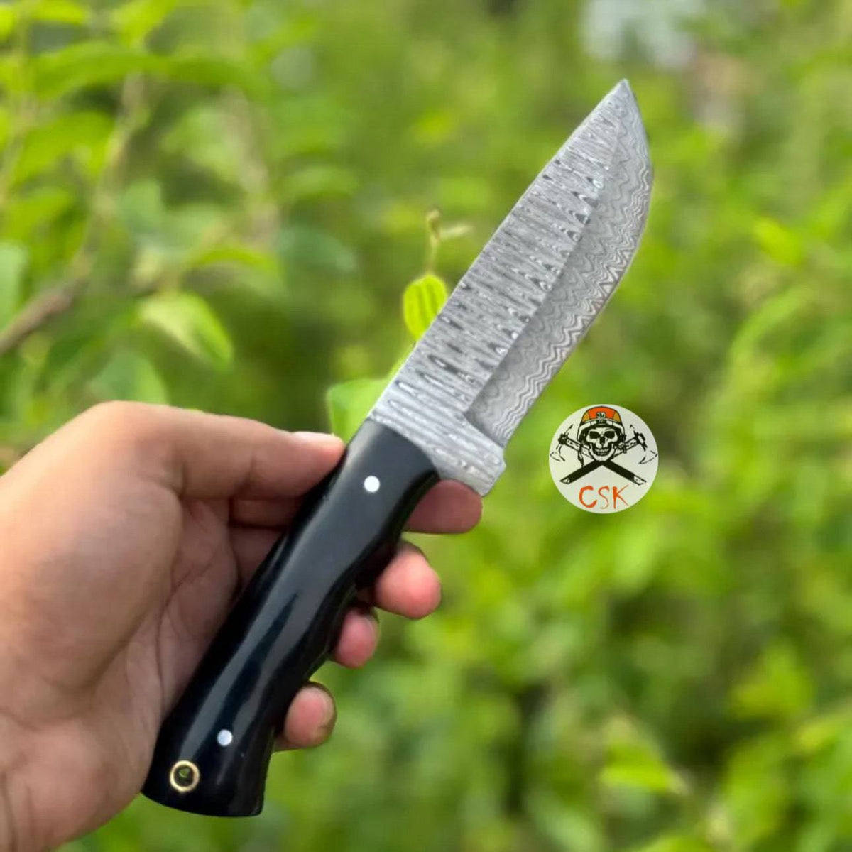 Premium hand-forged Damascus steel hunting knife with ergonomic black handle by cskforged, high-performance blade for outdoor use