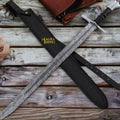 Handmade Medieval Damascus Templar Knight sword with leather sheath, featuring intricate blade patterns and detailed hilt by MALIKA KNIVES.