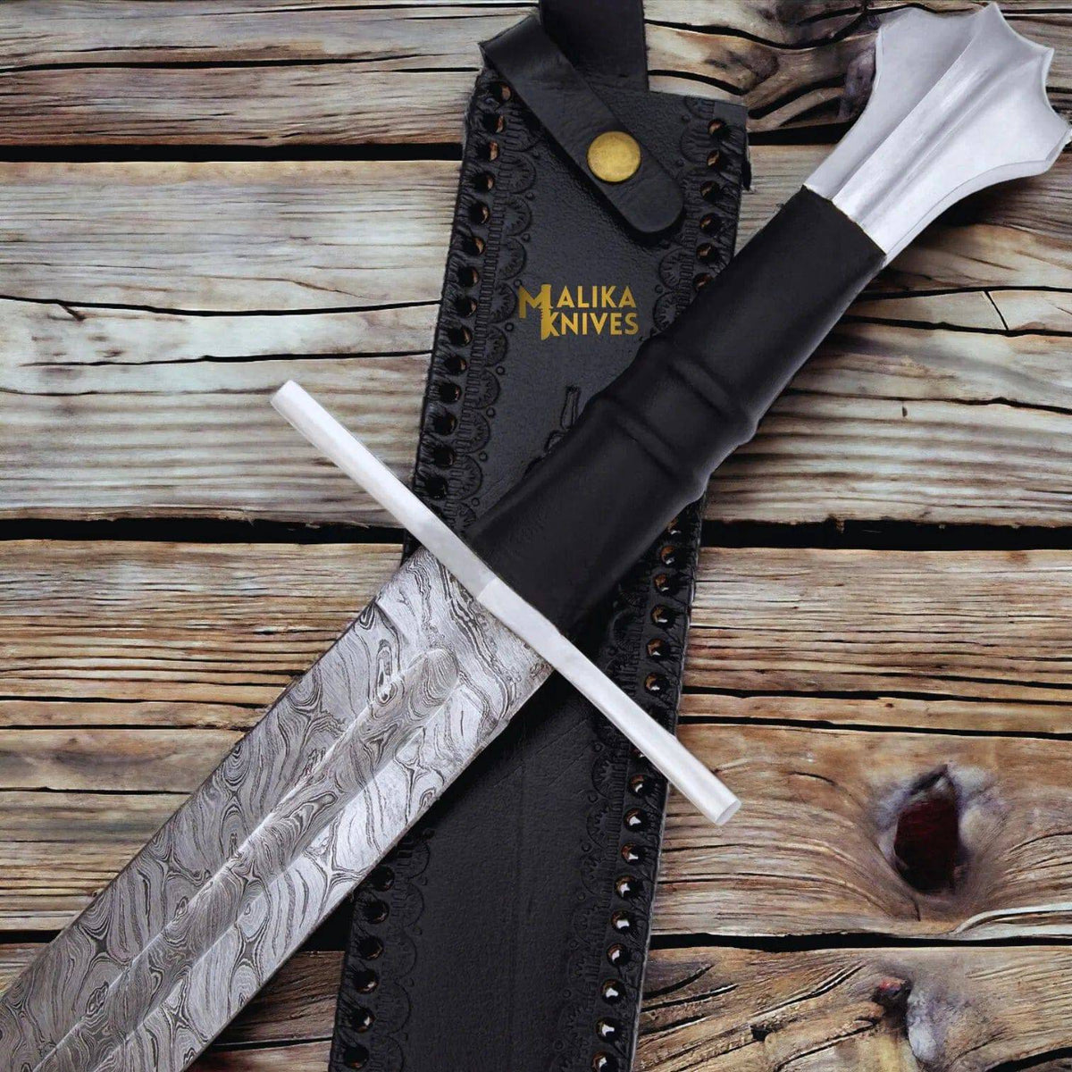 Handmade medieval Damascus Templar Knight sword with leather sheath by MALIKA KNIVES, featuring intricate Damascus blade detailing.