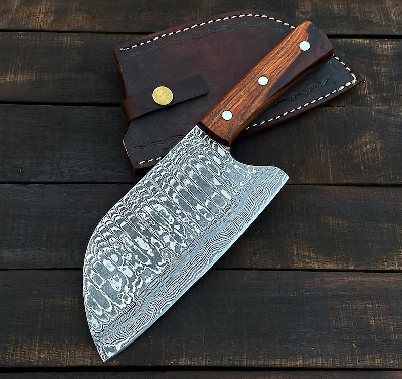 Handmade 10-inch Damascus steel cleaver knife with rosewood handle and leather sheath, ideal for professional kitchen use.