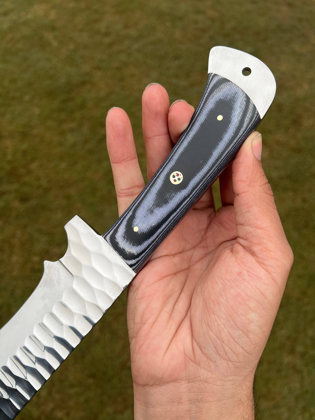 Fixed blade camping knife by cskforged, hand forged from D2 steel, featuring a sturdy handle and sharp blade for outdoor use.