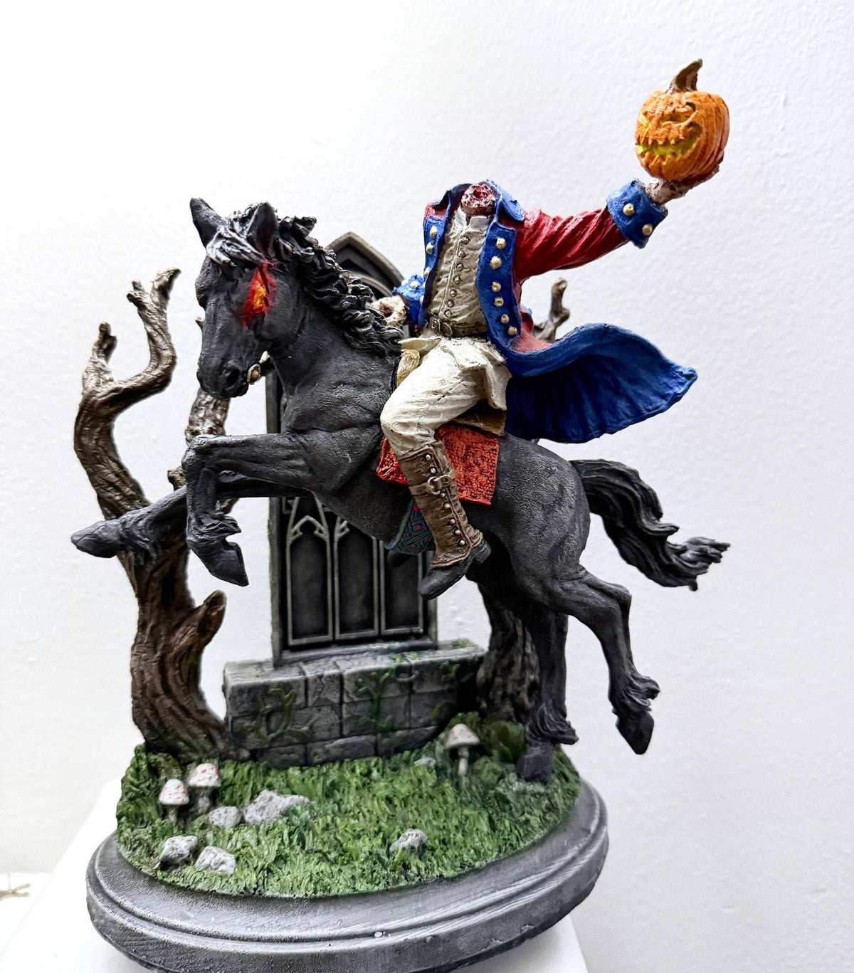 Full color resin Headless Horseman riding statue by Dellamorte & Co., gothic Sleepy Hollow folklore sculpture for spooky decor