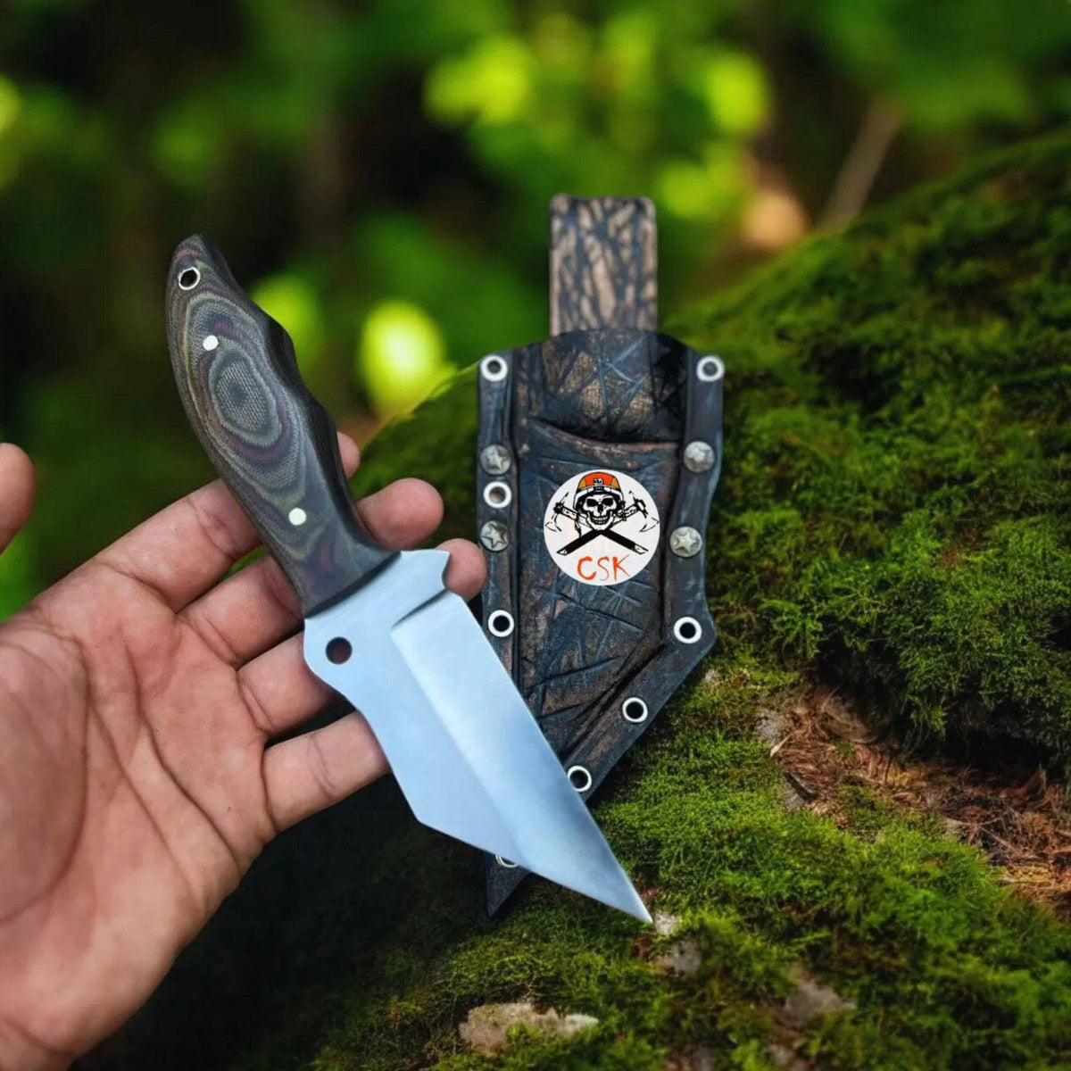 Ronin fixed-blade hunting knife by cskforged with durable G10 handle and sharp blade, suitable for outdoor and hunting tasks.
