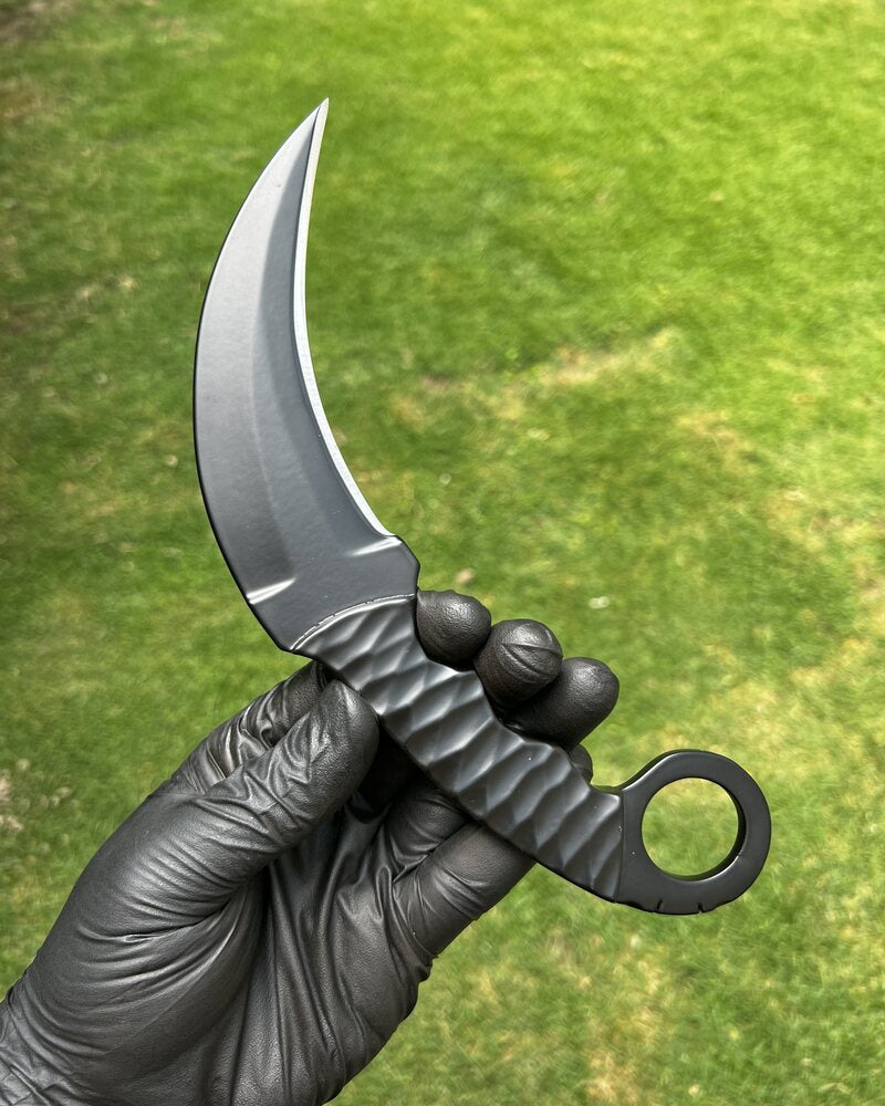 Black Karambit knife from Knives Gear Garage with powder-coated finish, designed for EDC and tactical use.