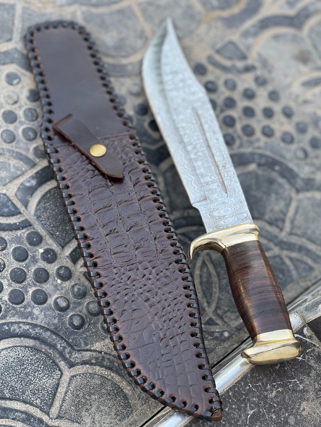 Handmade Damascus steel Crocodile Dundee Bowie knife by Knives Gear Garage with brass guard and leather handle, 16-inch blade.