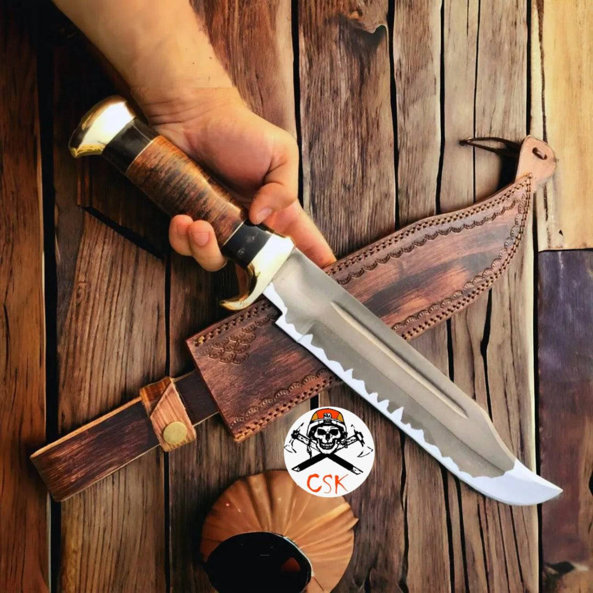 Cskforged D2 steel Crocodile Dundee hunting knife with acid-etched blade and ergonomic handle, suitable for outdoor use.