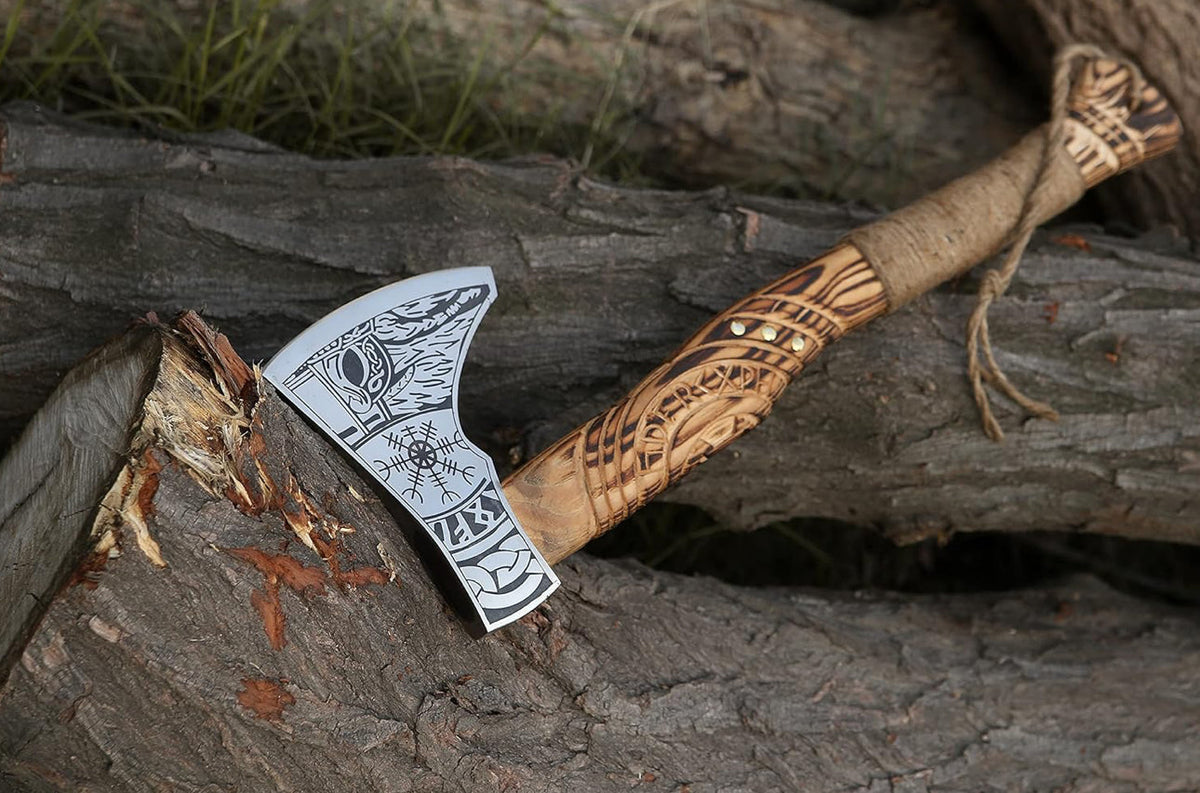 Handmade Viking axe hatchet by Knives Gear Garage, hand-forged wood splitting axe with a wooden handle and metal blade.