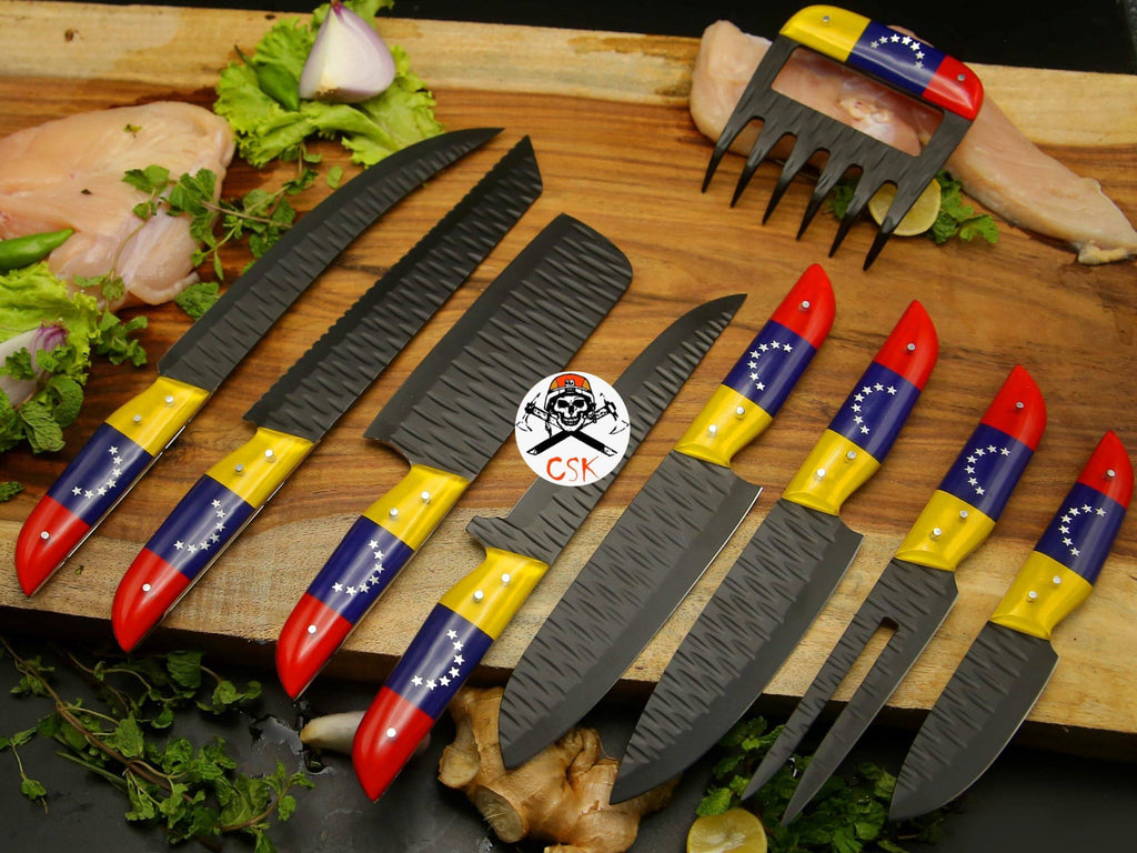 Black stainless steel chef knife by cskforged with a sharp blade and ergonomic handle, designed for precise culinary cutting tasks.