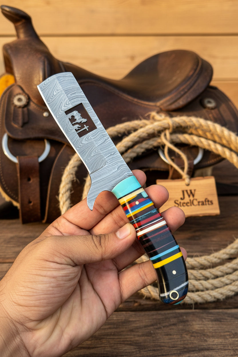 Damascus Bull Cutter Knife — Multi-Color Rainbow Resin Handle, Christian Cross Blade Engraving, Steel Bolster & Lanyard Hole
