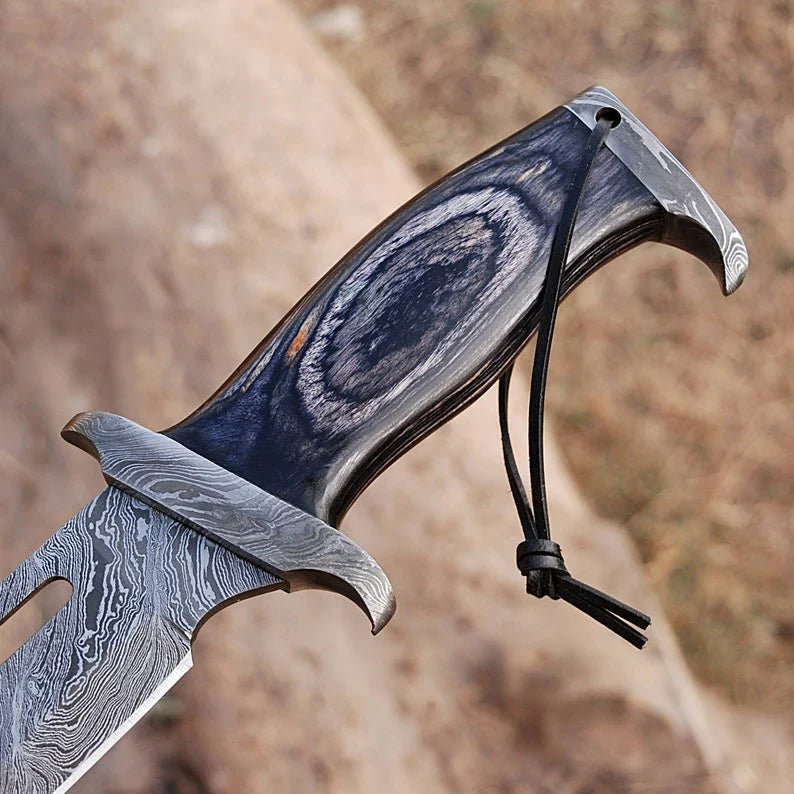 Custom handmade Damascus steel Rambo Bowie knife with brass wood handle and leather sheath, crafted by Knives Gear Garage.