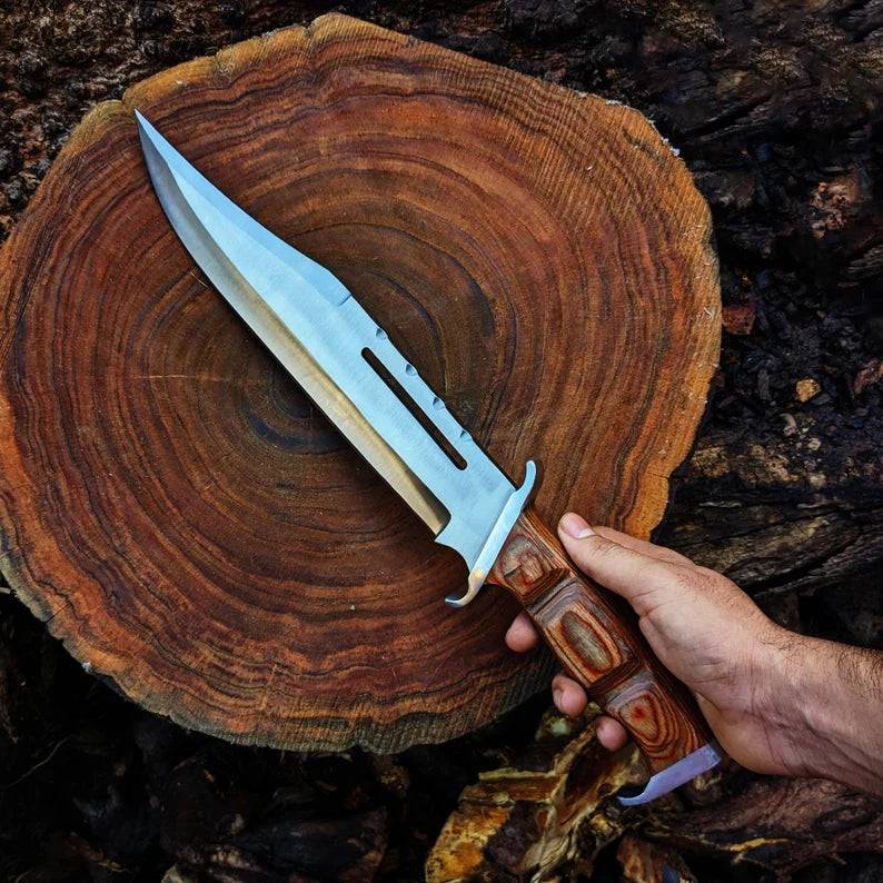 Close-up of cskforged Rambo Knife with D2 steel blade, rugged handle, and survival knife design for outdoor use.
