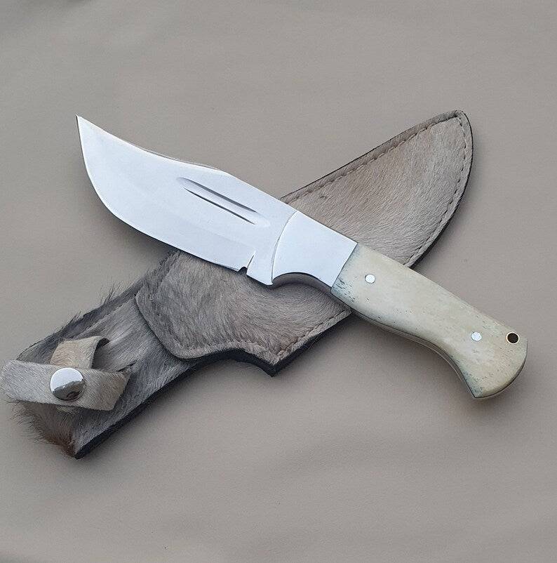 Handmade 8-inch skinning knife with J2 steel blade and camel bone handle by Knives Gear Garage.