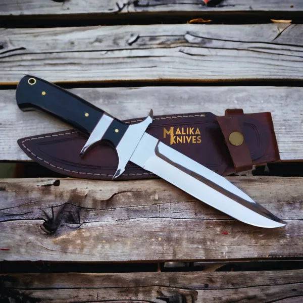 MALIKA KNIVES Bowie knife with D2 steel blade and Micarta handle, featuring a simple design and sharp pointed tip.