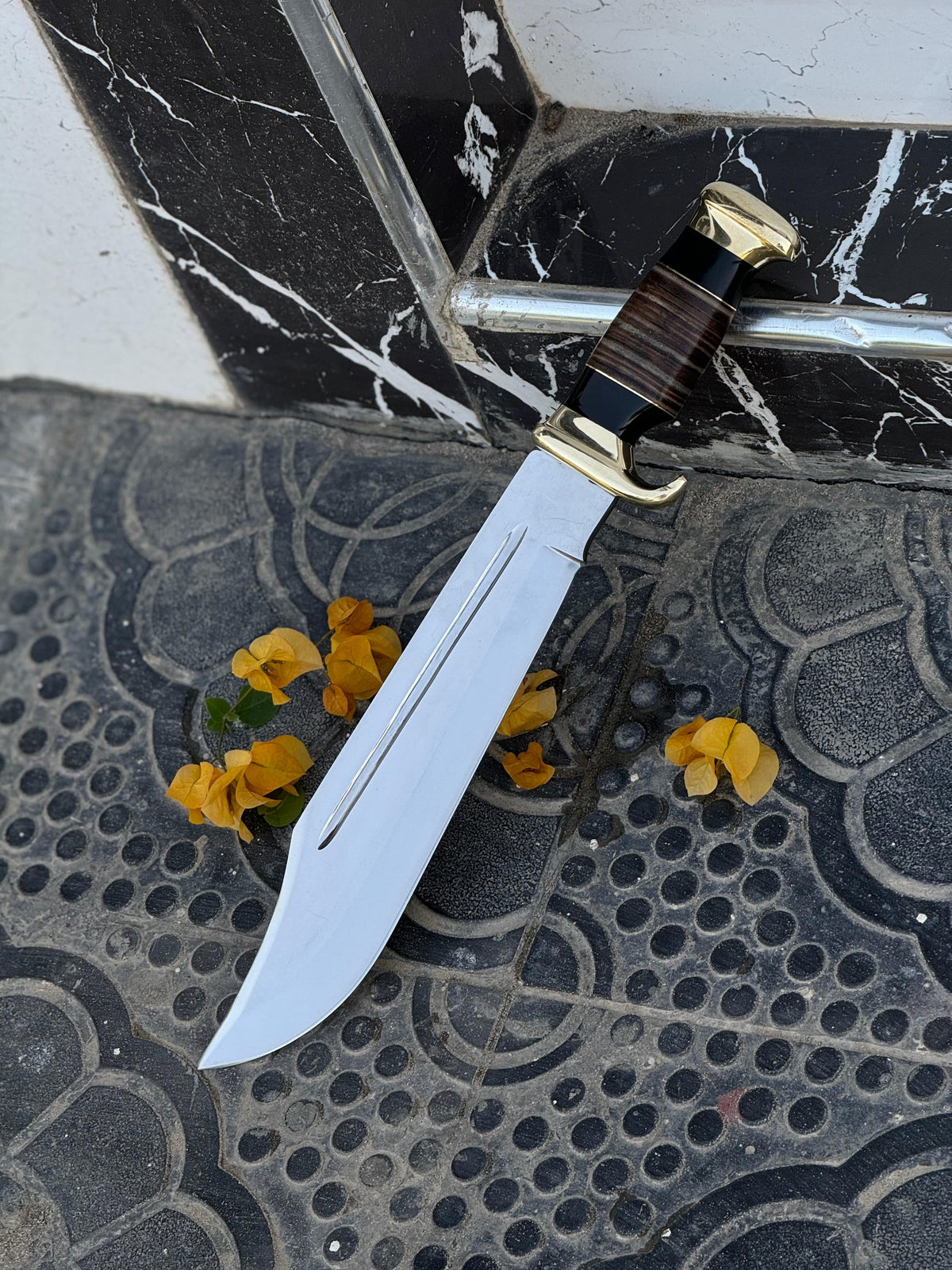Custom handmade J2 steel Crocodile Dundee Bowie knife with brass guard and leather handle, 16-inch blade from Knives Gear Garage.