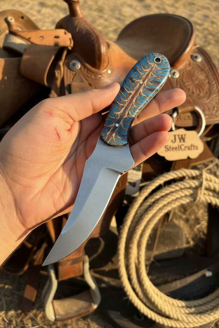 JW SteelCrafts Antler Ridge Skinner Knife with 8-inch Damascus blade and stag horn handle, handcrafted for outdoor use.