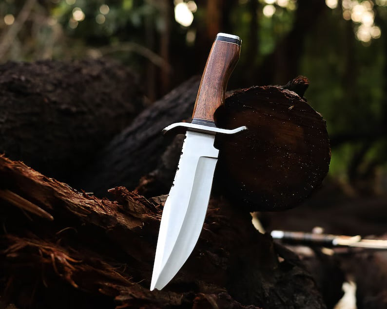 Handcrafted J2 steel Bowie knife with 13-inch bone handle, steel guard, and leather sheath by Knives Gear Garage.