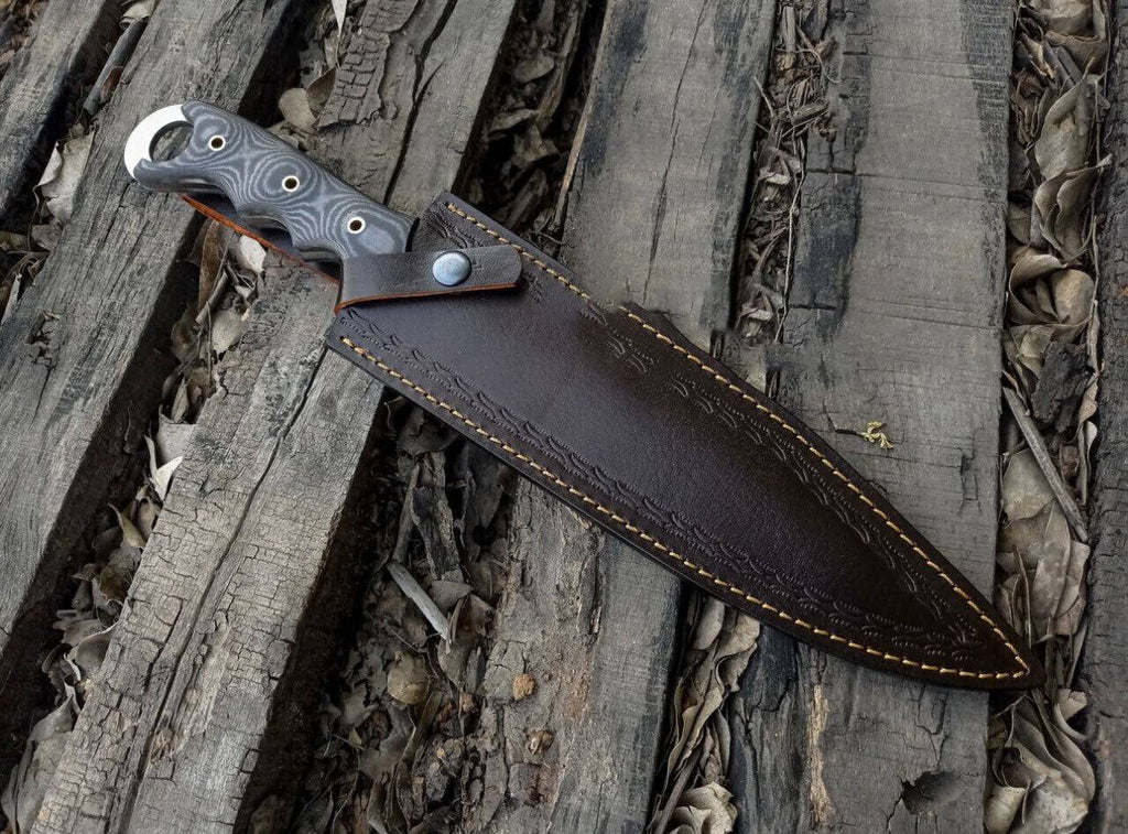 Black Talon Ravenclaw Combat Survival knife by cskforged with a black handle and sharp stainless steel blade.