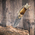 Damascus steel Fish folding pocket knife by cskforged with a 7-inch blade, featuring intricate patterning and a durable handle