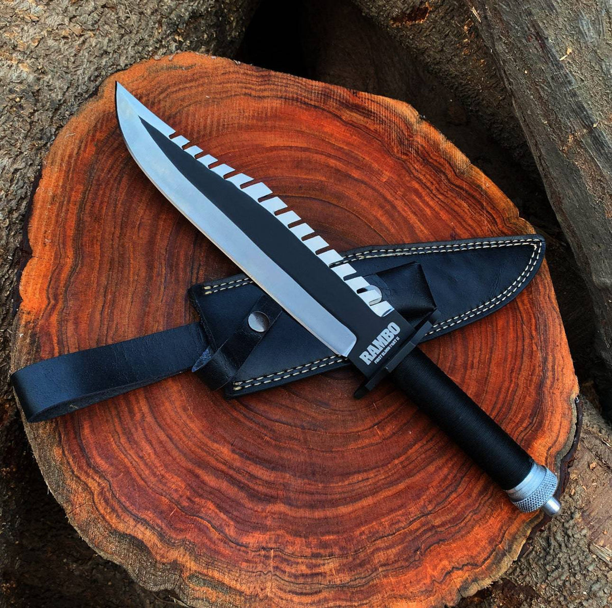 Custom handmade Rambo knife by cskforged, replica of First Blood Part 2 movie knife with detailed blade and handle.