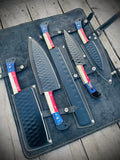 Set of handmade BBQ, chef, and kitchen knives from Knives Gear Garage with wooden handles and stainless steel blades.