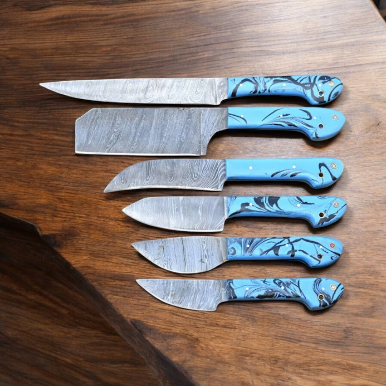 Chef's knife from Knives Gear Garage premium kitchen knives set with Damascus steel blade and polished resin handle.