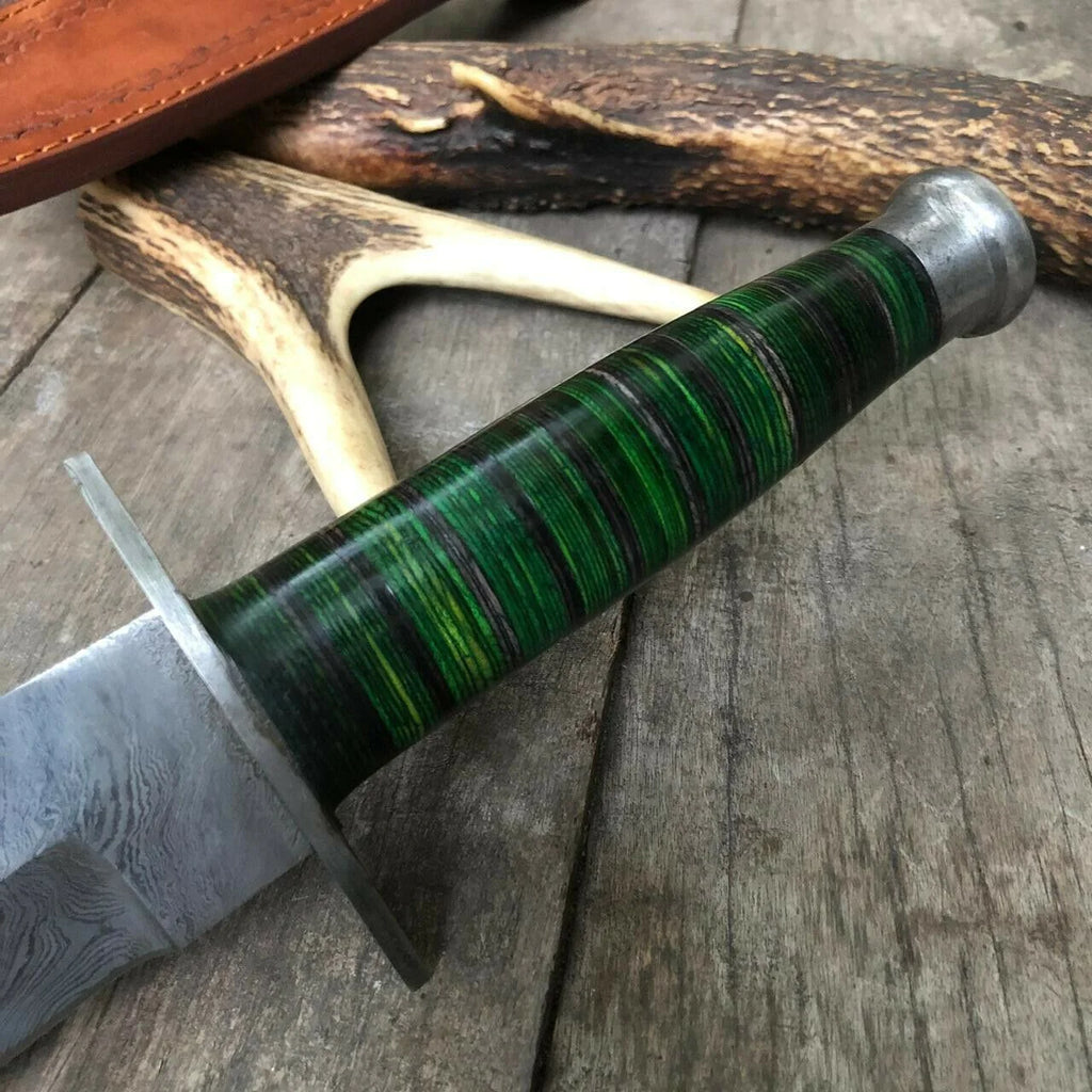 Custom handmade 12-inch Damascus steel Bowie knife with green hardwood handle, Damascus bolster, and leather sheath.