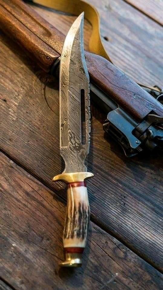 Custom 14-inch Damascus steel Bowie knife with brass guard and stag horn handle, includes leather sheath, by Knives Gear Garage.