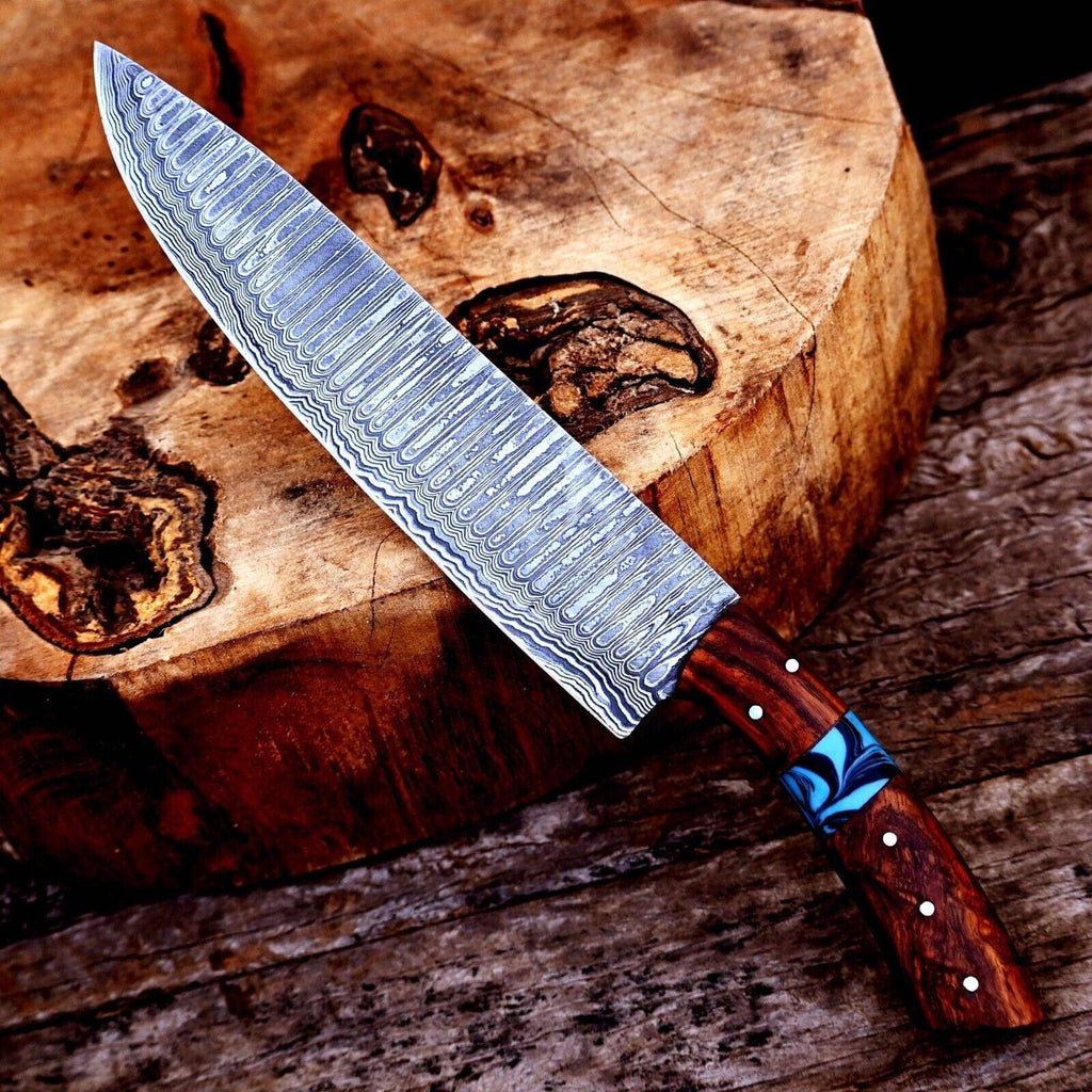 Handmade 7-inch Damascus steel chef knife with rosewood and resin handle, crafted for precision culinary tasks.